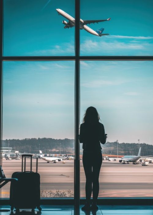 From KlickPin CF Woman waiting at airport window by Beautiful things on @creativemarket in 2025 _ My photo gallery Travel photos Houston airport